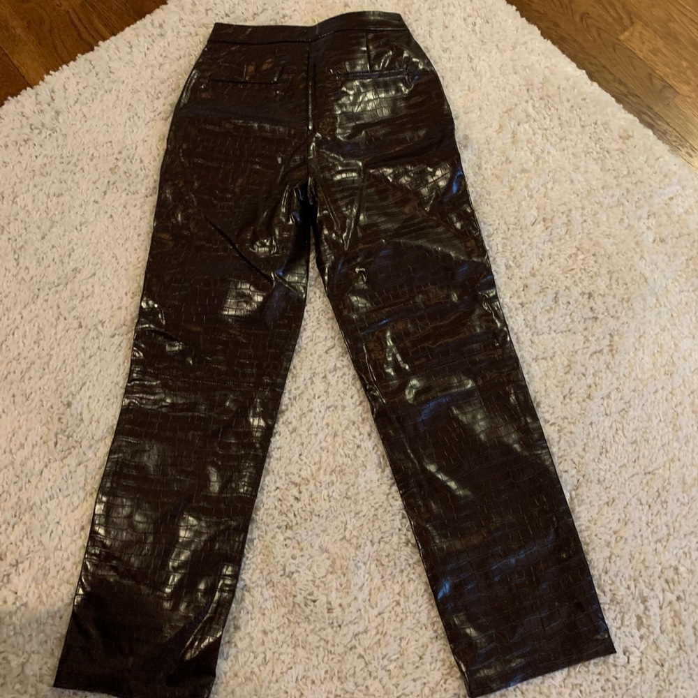 NWT brown wide leg pants! Brand new Sz 6. Not sure material but shiny